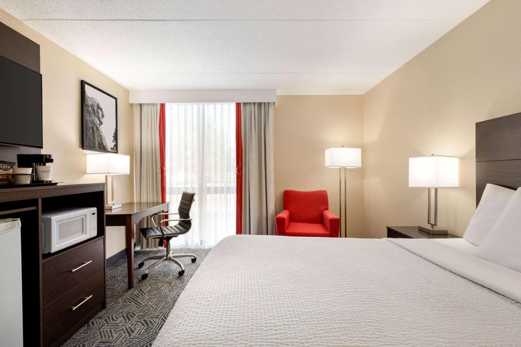 Hotel Ramada By Wyndham Alpena Exterior foto